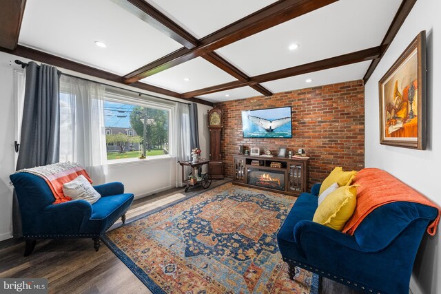 living room with wood finished floors, brick wall, beamed ceiling, baseboards, and recessed lighting