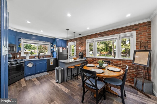 dining area with ornamental molding, brick wall, dark wood finished floors, and recessed lighting