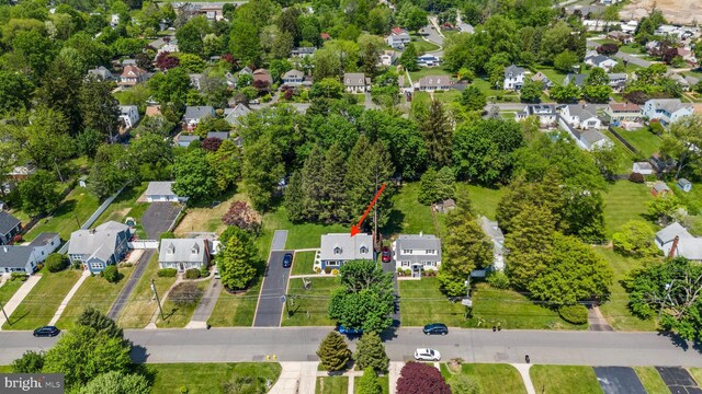 aerial overview of property's location with nearby suburban area