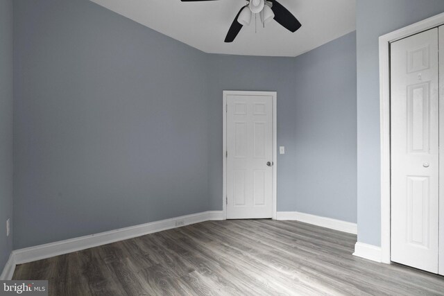 524 N Loudon Ave, Baltimore, MD 21229 - empty room featuring baseboards, a ceiling fan, and wood finished floors