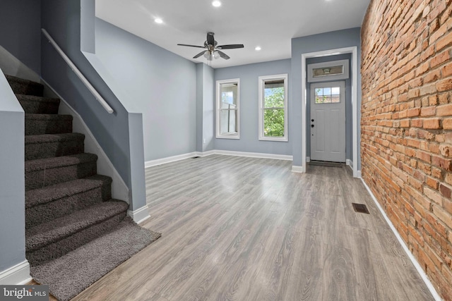 524 N Loudon Ave, Baltimore, MD 21229 - foyer entrance featuring stairway, wood finished floors, visible vents, and ceiling fan