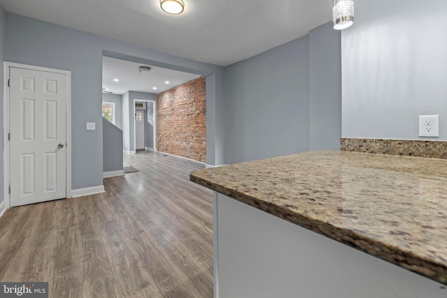 524 N Loudon Ave, Baltimore, MD 21229 - kitchen with baseboards, decorative light fixtures, and wood finished floors