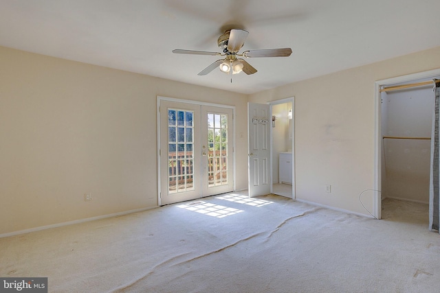 unfurnished bedroom with access to exterior, carpet flooring, french doors, and baseboards