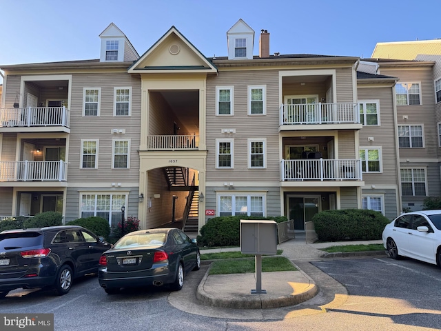 1037 Gardenview Loop Unit 304, Woodbridge, VA 22191 - view of property with uncovered parking