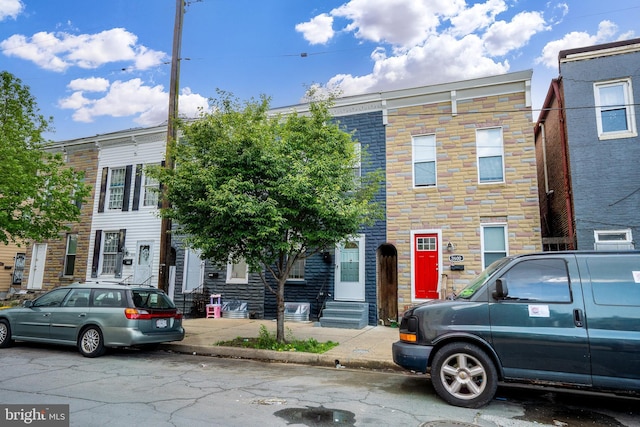 3602 5th St, Baltimore, MD 21225 - view of property featuring entry steps and stone siding