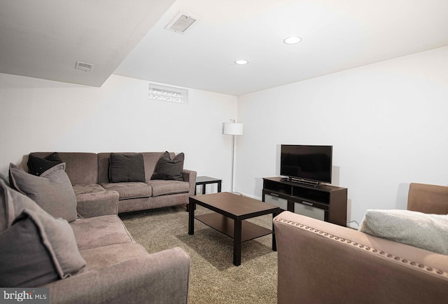 living area with recessed lighting and carpet flooring