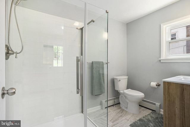 full bathroom featuring baseboard heating, a baseboard radiator, a stall shower, and toilet