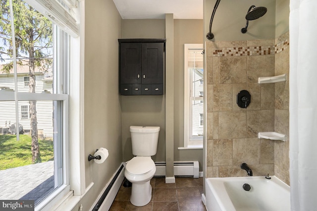 bathroom featuring a baseboard heating unit, tile patterned flooring, toilet, and healthy amount of natural light