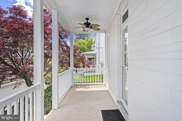 view of patio with a ceiling fan and a porch