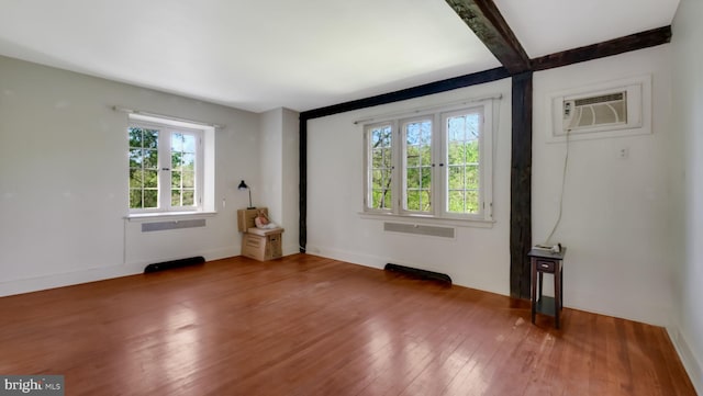 203 E Ferry Rd, Yardley, PA 19067 - spare room featuring hardwood / wood-style floors and a wall unit AC