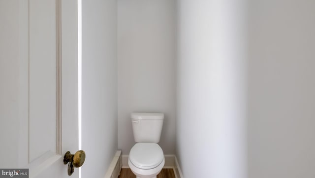 203 E Ferry Rd, Yardley, PA 19067 - bathroom with toilet, baseboards, and a baseboard heating unit
