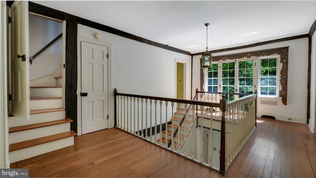 203 E Ferry Rd, Yardley, PA 19067 - stairway with crown molding and hardwood / wood-style floors