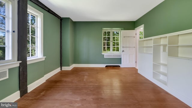 203 E Ferry Rd, Yardley, PA 19067 - empty room featuring baseboards, plenty of natural light, and wood finished floors