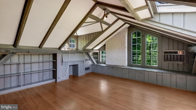 203 E Ferry Rd, Yardley, PA 19067 - additional living space with wood finished floors and lofted ceiling with skylight