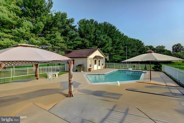 1140 Governor Lea Rd, Bear, DE 19701 - view of swimming pool featuring an outbuilding, a fenced in pool, fence, a patio area, and a gazebo