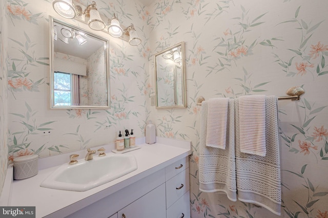 1140 Governor Lea Rd, Bear, DE 19701 - bathroom with wallpapered walls and vanity