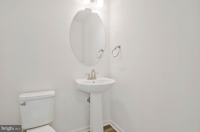 1646 Aster Ln, Hanover, MD 21076 - half bath featuring toilet and baseboards