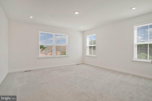 1646 Aster Ln, Hanover, MD 21076 - spare room with light carpet, baseboards, and recessed lighting