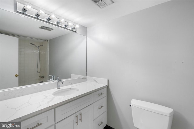 6317 Park Heights Ave Unit 616, Baltimore, MD 21215 - full bathroom with vanity, toilet, visible vents, and a tile shower