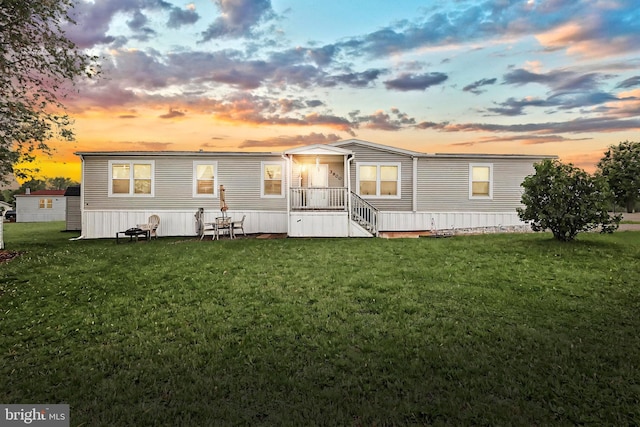 3900 Craig Ave, Dover, PA 17315 - back of property at dusk featuring a lawn