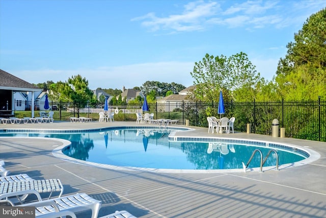10288 Broken Sound Blvd, Ocean City, MD 21842 - community pool featuring a patio and fence