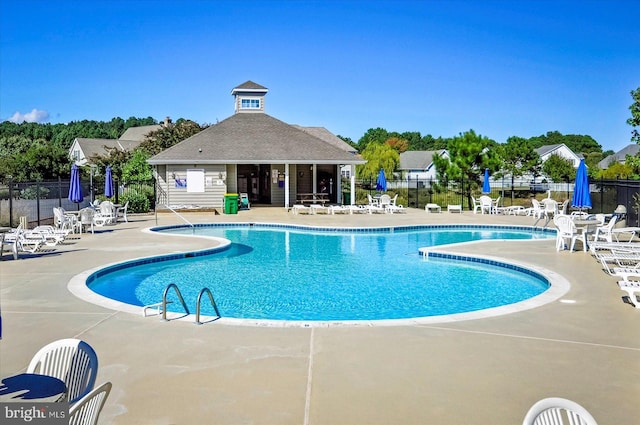 10288 Broken Sound Blvd, Ocean City, MD 21842 - community pool featuring fence and a patio area