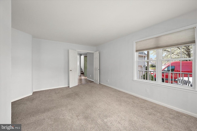 10288 Broken Sound Blvd, Ocean City, MD 21842 - unfurnished room featuring carpet flooring and baseboards