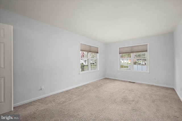 10288 Broken Sound Blvd, Ocean City, MD 21842 - carpeted spare room featuring baseboards