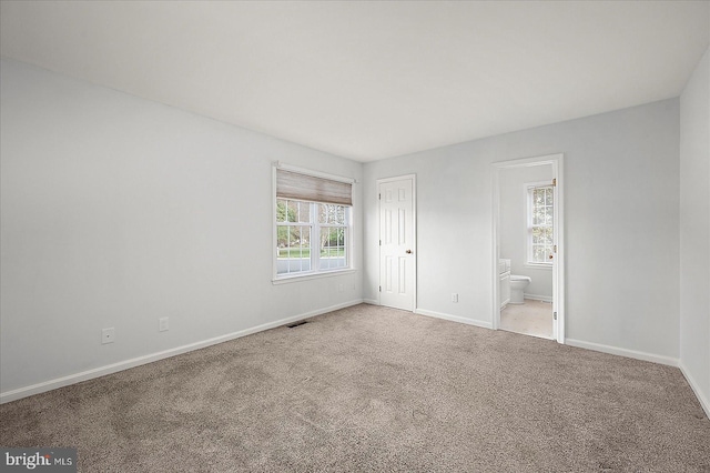 10288 Broken Sound Blvd, Ocean City, MD 21842 - unfurnished bedroom with carpet floors, baseboards, and ensuite bathroom