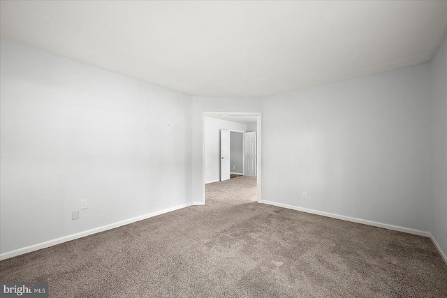 10288 Broken Sound Blvd, Ocean City, MD 21842 - empty room featuring carpet and baseboards