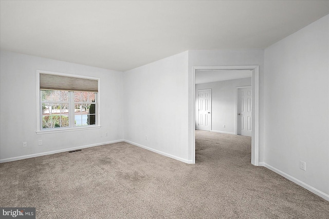 10288 Broken Sound Blvd, Ocean City, MD 21842 - spare room featuring carpet floors and baseboards