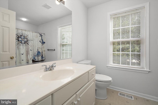 10288 Broken Sound Blvd, Ocean City, MD 21842 - bathroom with toilet, baseboards, vanity, tile patterned flooring, and a shower with shower curtain