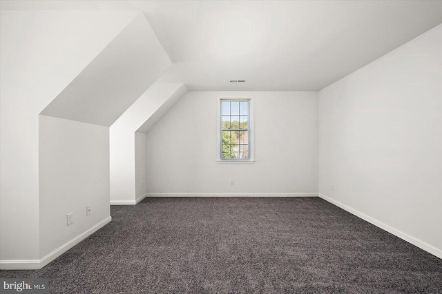 10288 Broken Sound Blvd, Ocean City, MD 21842 - bonus room featuring dark carpet, vaulted ceiling, and baseboards