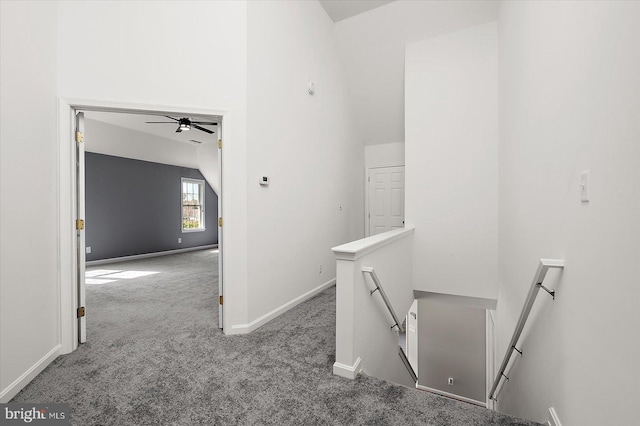 10288 Broken Sound Blvd, Ocean City, MD 21842 - corridor featuring an upstairs landing, carpet flooring, baseboards, and vaulted ceiling
