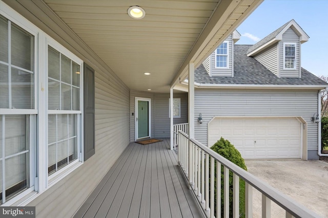 10288 Broken Sound Blvd, Ocean City, MD 21842 - wooden terrace featuring driveway and an attached garage