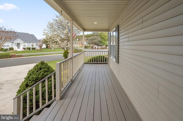 10288 Broken Sound Blvd, Ocean City, MD 21842 - wooden terrace with covered porch