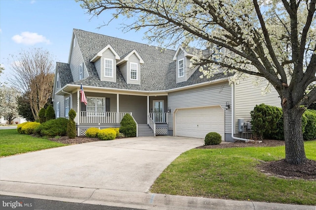 10288 Broken Sound Blvd, Ocean City, MD 21842 - cape cod-style house featuring a porch, roof with shingles, a front lawn, driveway, and a garage