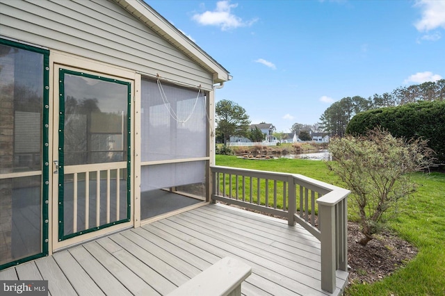 10288 Broken Sound Blvd, Ocean City, MD 21842 - wooden deck featuring a lawn