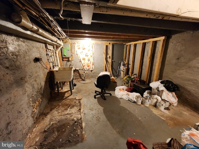 unfinished below grade area featuring electric panel