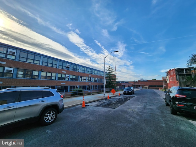 view of road with street lights and sidewalks
