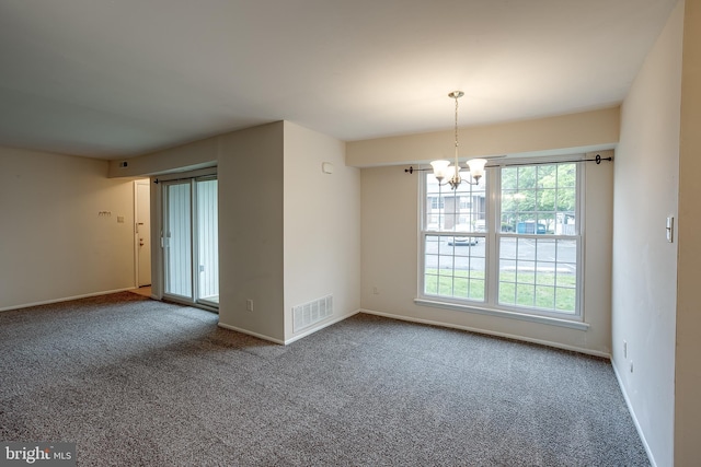 275 Green St Unit 4G1, Edgewater Park, NJ 08010 - carpeted spare room with plenty of natural light, a chandelier, and baseboards