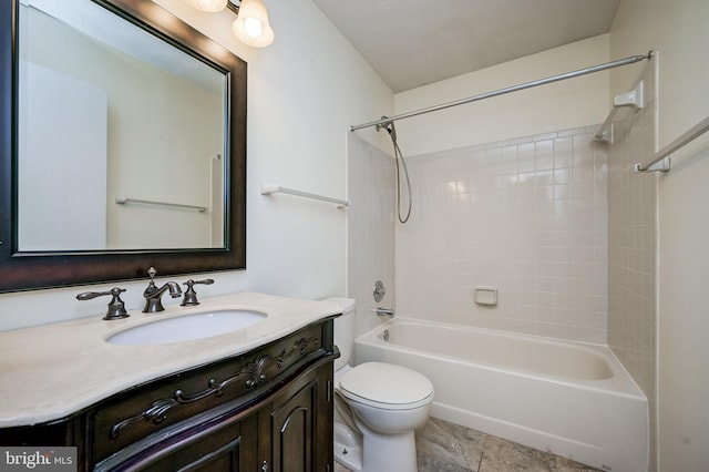 full bath featuring vanity, toilet, and shower / tub combination