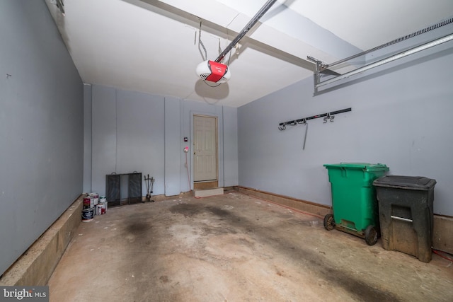 garage featuring a garage door opener