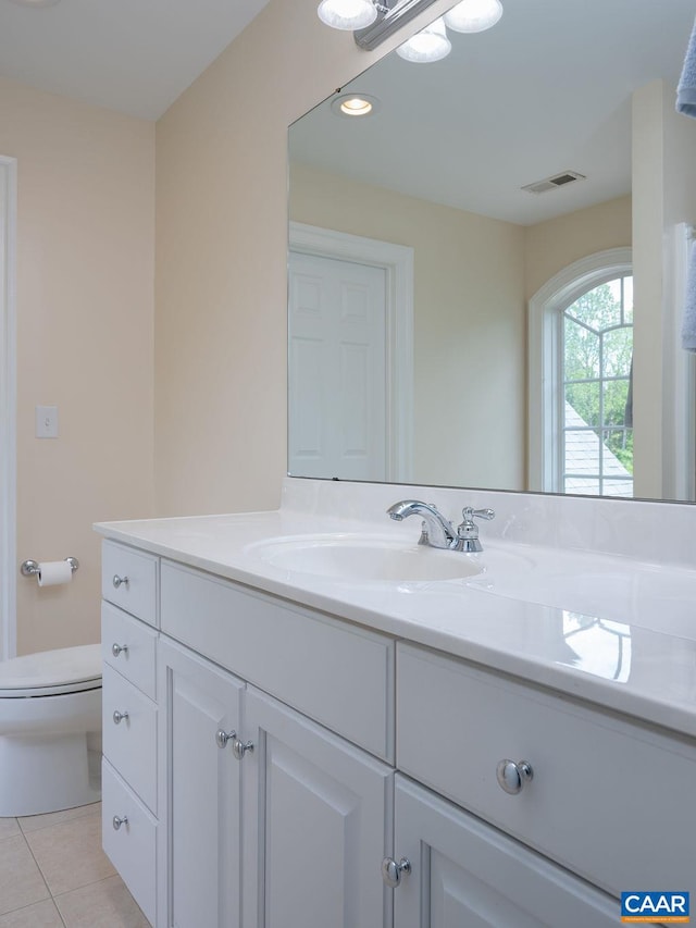 bathroom with vanity, tile patterned flooring, toilet, and recessed lighting