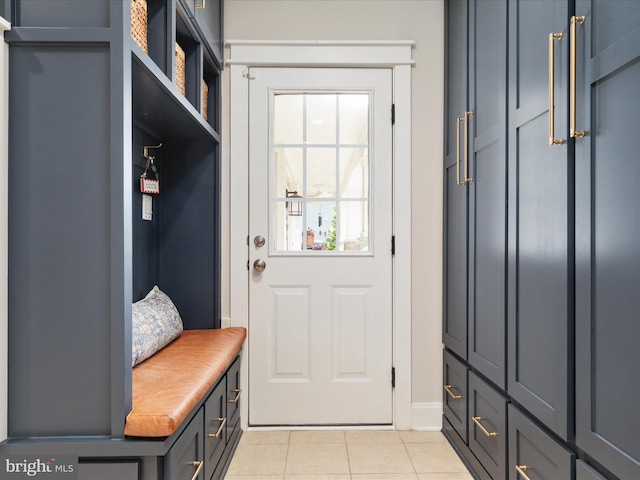 14484 Bluff Point Ct, Gainesville, VA 20155 - mudroom featuring light tile patterned floors and baseboards