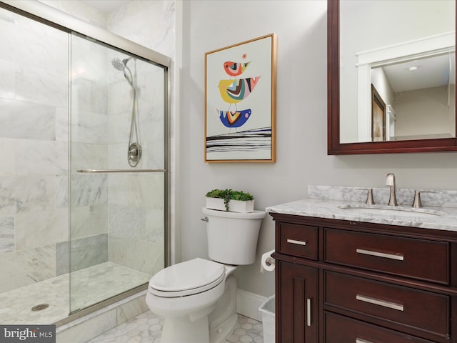 14484 Bluff Point Ct, Gainesville, VA 20155 - full bath featuring toilet, vanity, a stall shower, and baseboards