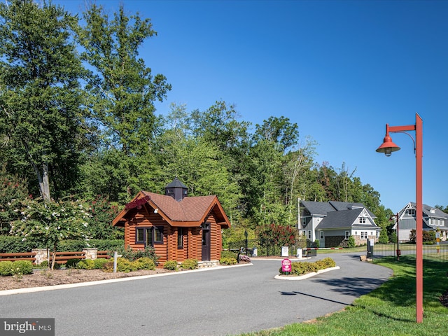 14484 Bluff Point Ct, Gainesville, VA 20155 - view of asphalt road featuring street lighting