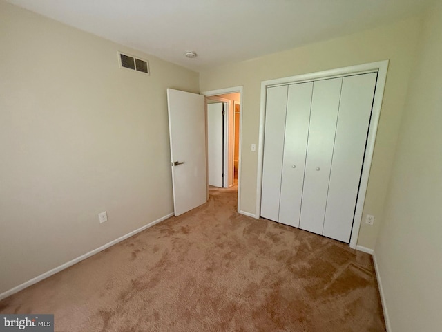 1010 Commanders Way N, Annapolis, MD 21409 - unfurnished bedroom with carpet floors, baseboards, and a closet