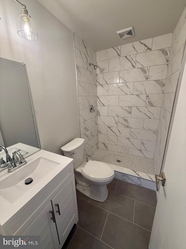 1010 Commanders Way N, Annapolis, MD 21409 - full bath featuring vanity, a stall shower, toilet, and tile patterned flooring
