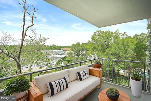 5101 River Rd Unit 811, Bethesda, MD 20816 - balcony with an outdoor hangout area and view of wooded area